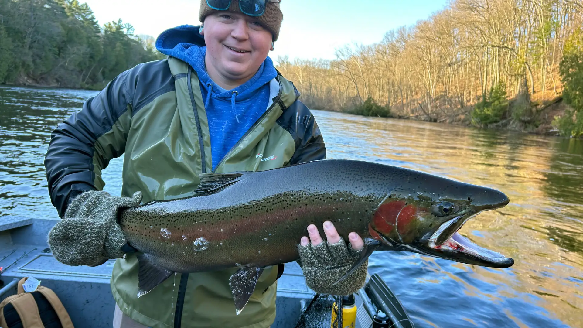 Close up of a person holding a trout
